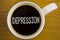 Word writing text Depression. Business concept for Work stress with sleepless nights having anxiety disorder written on Black Tea