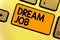 Word writing text Dream Job. Business concept for An act that is paid of by salary and giving you hapiness Keyboard yellow key Int