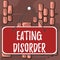 Word writing text Eating Disorder. Business concept for illnesses that are characterized by irregular eating habits Colored memo