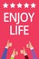 Word writing text Enjoy Life. Business concept for Any thing, place,food or person, that makes you relax and happy Men women hands