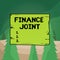 Word writing text Finance Joint. Business concept for provision of funds for a project came from two or more sources Wooden square