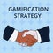 Word writing text Gamification Strategy. Business concept for use Rewards for Motivation Integrate Game Mechanics Hand