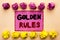 Word writing text Golden Rules. Business concept for Regulation Principles Core Purpose Plan Norm Policy Statement written on Pink