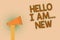 Word writing text Hello I Am... New. Business concept for Introduce yourself Meeting Greeting Work Fresh worker School Hand brown