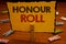 Word writing text Honour Roll. Business concept for List of students who have earned grades above a specific averageClothespin hol