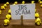 Word writing text Irs Scam. Business concept for targeted taxpayers by pretending to be Internal Revenue Service Clothespin hold h