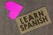 Word writing text Learn Spanish. Business concept for Translation Language in Spain Vocabulary Dialect Speech Piece squared paperb