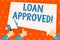 Word writing text Loan Approved. Business concept for sum of money borrowed by a customer to a bank is granted Hand