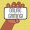 Word writing text Online Gaming. Business concept for action or practice of playing video games on the internet Closeup