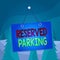 Word writing text Reserved Parking. Business concept for parking spaces that are reserved for specific individuals Colored memo