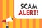 Word writing text Scam Alert. Business concept for warning someone about scheme or fraud notice any unusual Man holding megaphone