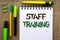 Word writing text Staff Training. Business concept for Teaching Teamwork new things Employee Education Preparation written on Note