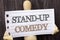 Word, writing, text Stand Up Comedy. Conceptual photo Entertainment Club Fun Show Comedian Night written on torn paper holding by