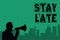 Word writing text Stay Late. Business concept for A routine in which a person goes to somewhere out of time Man holding megaphone