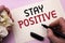 Word writing text Stay Positive. Business concept for Be Optimistic Motivated Good Attitude Inspired Hopeful written by Man on No