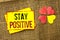 Word writing text Stay Positive. Business concept for Be Optimistic Motivated Good Attitude Inspired Hopeful written on Sticky Not