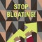 Word writing text Stop Bloating. Business concept for to end the condition where your belly feels full and tight photo