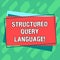 Word writing text Structured Query Language. Business concept for computer language for relational database Pile of