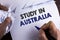 Word writing text Study In Australia. Business concept for Graduate from oversea universities great opportunity written by Man on