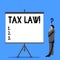 Word writing text Tax Law. Business concept for governmental assessment upon property value or transactions Businessman