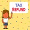 Word writing text Tax Refund. Business concept for refund on tax when the tax liability is less than the tax paid Woman