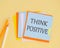 Word, writing Think Positive. Business concept for Positivity Attitude,Think Positive text on colorful notes