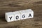 The word yoga written in cubes