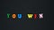 Word `you win` formed of wooden multicolored letters. Colorful words loop.