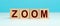 Word ZOOM made with cube wooden block