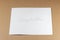 Wording Congratulation of white envelope on brown background