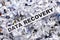 Words Data recovery on top of heap of cross shredded paper concept