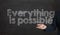 words Everything is possible written on blackboard presenting