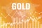Words Gold on yellow finance background from columns, line, candlestick, world map