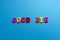 Words good bye from plastic magnetic letters on blue background