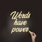 words have power written with woman`s hand on blackboard. Copyrighting PR, mass media or communication concept