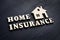 Words Home insurance and model of house