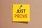 Words just prove written on yellow square paper and pinned on craft paperboard