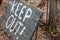 Words `keep out` painted on aged wooden board