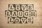 Words Live, Laugh, Love make by black alphabet stamps