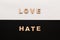 Words Love and Hate on contrast background
