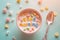 Words made of colorful cereal. Good Morning message in a bowl. Simple and fast breakfast. National cereal day. Minimal creative