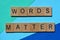 Words Matter, phrase on blue background