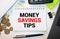 words 'money savings tips'. Business concept