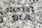 The words ROTH IRA laid with aluminium letters on the US dollar banknotes background - with selective focus