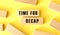 The words TIME FOR RECAP is written on a wooden blocks on a yellow background