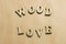 The words Wood and Love on a vintage wooden background