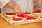 Work in bakery, making fruit filled pies