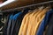 Work clothes on hangers in the store. Jackets workwear for builders and industry