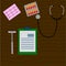 Work desk doctor, physician, which are neurological hammer, stethoscope, ECG, working notes, notepad, blister with capsules