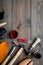 Work desk of shoemaker with instruments, wooden shoe and leather. Dark wooden background top view copy space